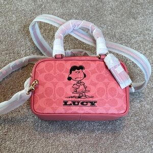 NWT coach purse featuring Lucy